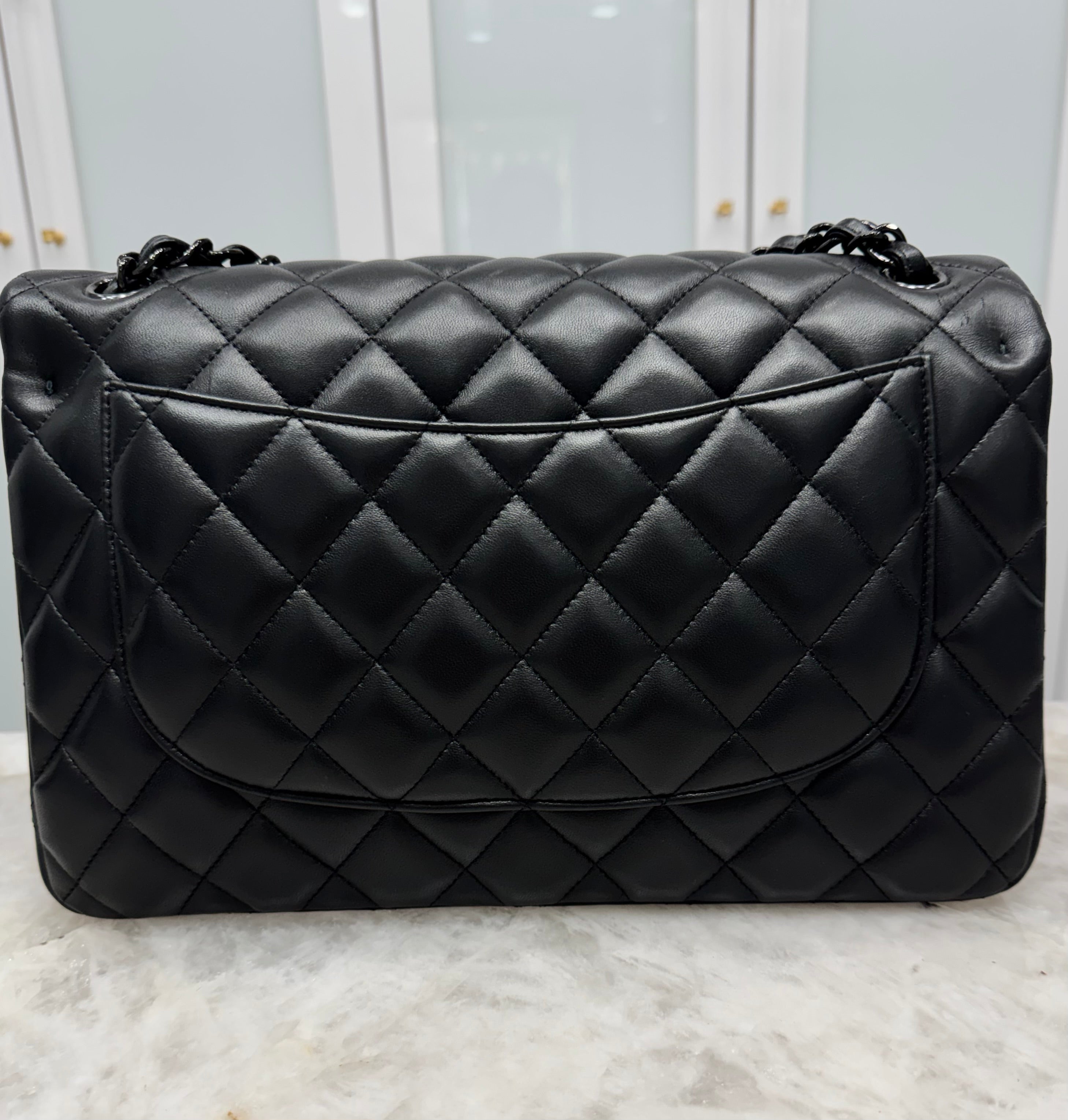 Chanel “So Black” Jumbo Double Flap Bag.