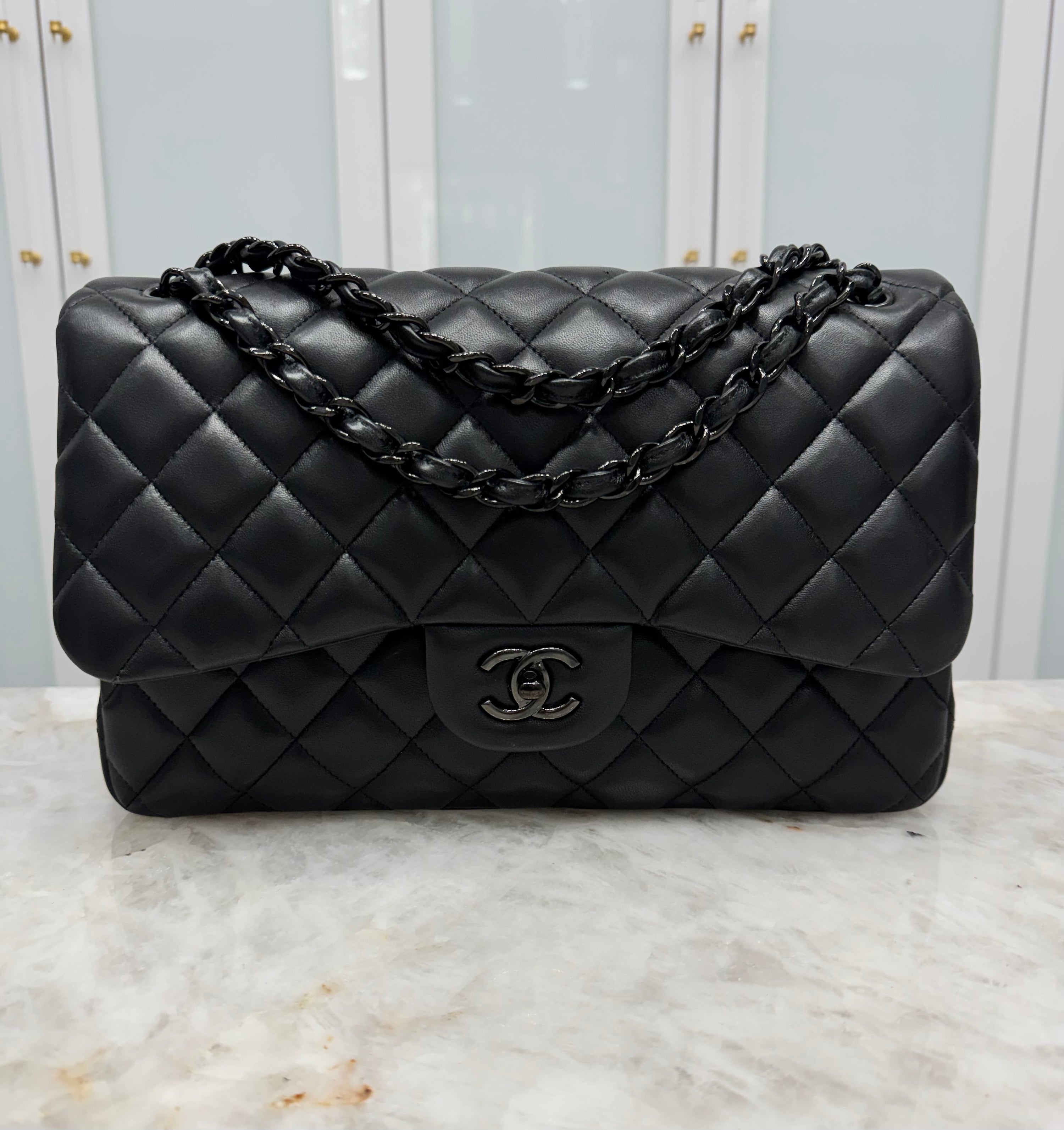 Chanel “So Black” Jumbo Double Flap Bag.